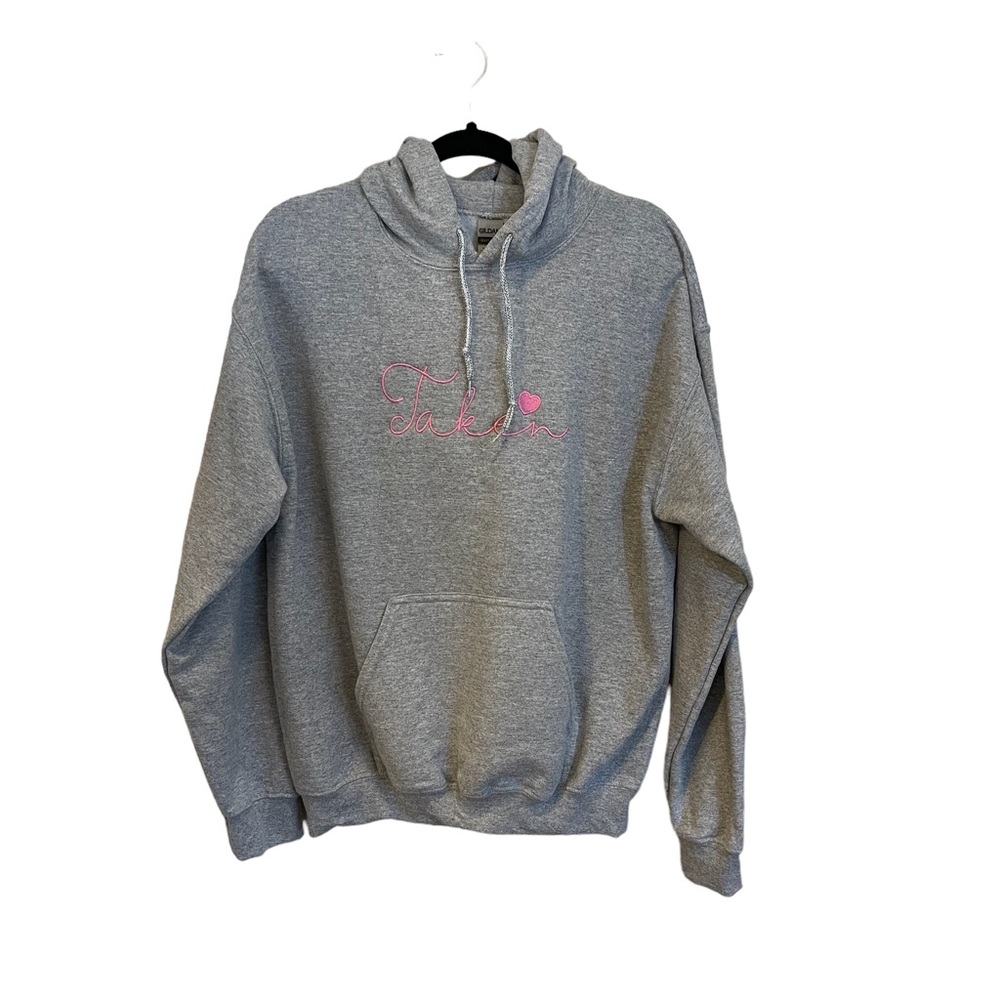 New Gildan medium hooded sweatshirt “taken” embroidered pink lettering feature